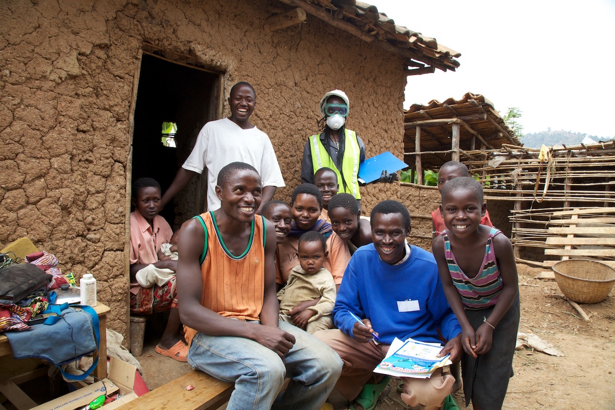 IRS spray campaign team with villagers, Rwanda