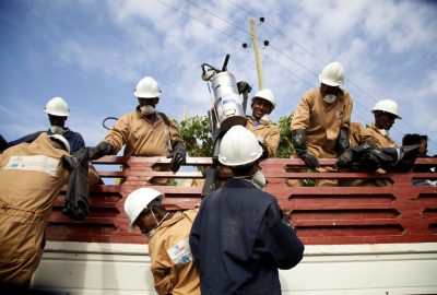 IRS spray team unload their truck during IRS campaign, Ethiopia 2014